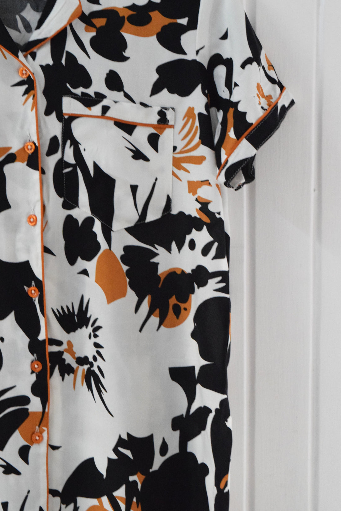 Close-up view of the handmade rayon cotton black and white abstract floral pajama set for women, showcasing the print and soft fabric.