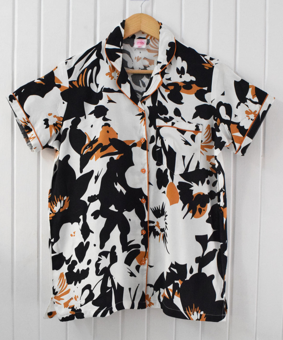 Close-up view of the handmade rayon cotton black and white abstract floral pajama set for women, showcasing the print and soft fabric.